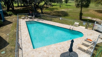 Under contract-accepting backup offers. Welcome to the charming on Tarpon Springs Golf Course in Florida - for sale on GolfHomes.com, golf home, golf lot