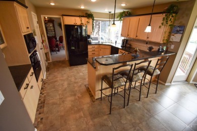 Welcome to your dream home! Nestled amidst lush landscaping and on Quail Ridge Golf Course in Washington - for sale on GolfHomes.com, golf home, golf lot