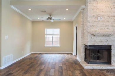 Upon opening the door to this brick 3 bedroom, 2 bath home in on Tiger Point Golf and Country Club in Florida - for sale on GolfHomes.com, golf home, golf lot