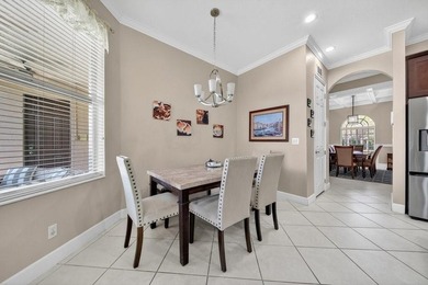 Lowest priced home in the Estates! 4 possible 5 bedroom split on Hammock Creek Golf Club in Florida - for sale on GolfHomes.com, golf home, golf lot