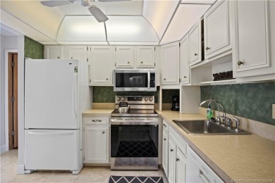 Enjoy your private entrance in this first floor, end unit condo on Martin County Golf Course in Florida - for sale on GolfHomes.com, golf home, golf lot