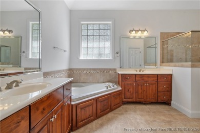Nestled in the prestigious Anderson Creek Club, this stunning on Anderson Creek Golf Club in North Carolina - for sale on GolfHomes.com, golf home, golf lot