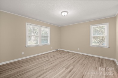 Welcome to this charming 3-bedroom, 2-bath home in Tega on Tega Cay Golf Club in South Carolina - for sale on GolfHomes.com, golf home, golf lot