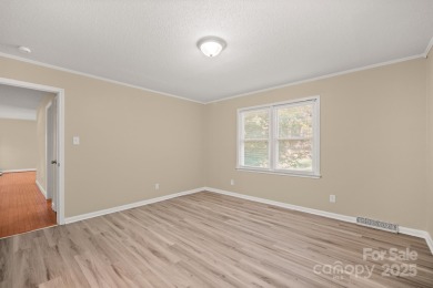 Welcome to this charming 3-bedroom, 2-bath home in Tega on Tega Cay Golf Club in South Carolina - for sale on GolfHomes.com, golf home, golf lot