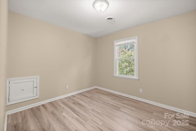 Welcome to this charming 3-bedroom, 2-bath home in Tega on Tega Cay Golf Club in South Carolina - for sale on GolfHomes.com, golf home, golf lot