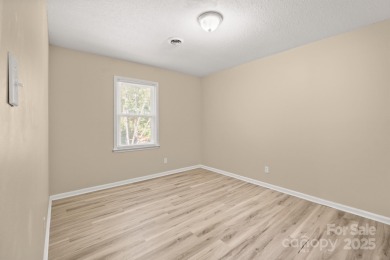Welcome to this charming 3-bedroom, 2-bath home in Tega on Tega Cay Golf Club in South Carolina - for sale on GolfHomes.com, golf home, golf lot