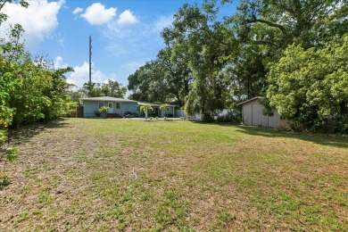 WATERFRONT PROPERTY HIGH AND DRY AFTER HELENE!  This property is on Clearwater Country Club in Florida - for sale on GolfHomes.com, golf home, golf lot