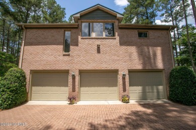 This wonderful brick, golf and waterfront home is situated on on Pinewild Country Club of Pinehurst in North Carolina - for sale on GolfHomes.com, golf home, golf lot