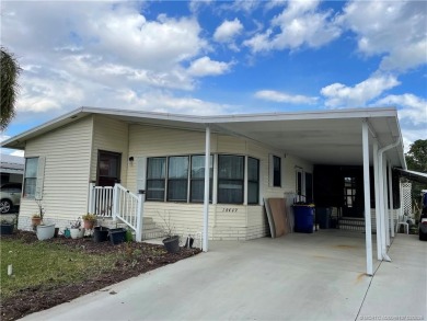 Make this lovely home yours with plenty of room for friends & on Indianwood Golf and Country Club in Florida - for sale on GolfHomes.com, golf home, golf lot