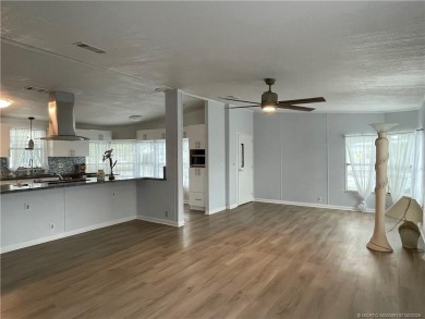 Make this lovely home yours with plenty of room for friends & on Indianwood Golf and Country Club in Florida - for sale on GolfHomes.com, golf home, golf lot