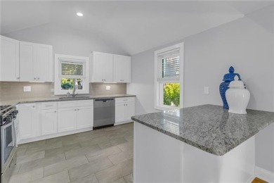 This Salt Box-inspired beauty, echoes the cozy charm of early on Tides Inn Par 3 Course in Virginia - for sale on GolfHomes.com, golf home, golf lot