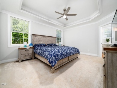 Resort-style living awaits in this beautifully crafted 2023 on River Golf and County Club at Lake Royale in North Carolina - for sale on GolfHomes.com, golf home, golf lot