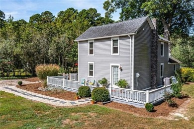 This Salt Box-inspired beauty, echoes the cozy charm of early on Tides Inn Par 3 Course in Virginia - for sale on GolfHomes.com, golf home, golf lot