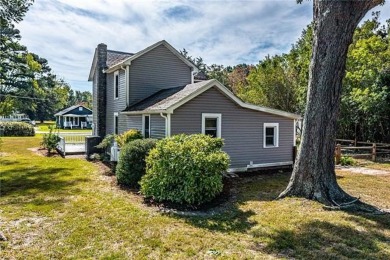 This Salt Box-inspired beauty, echoes the cozy charm of early on Tides Inn Par 3 Course in Virginia - for sale on GolfHomes.com, golf home, golf lot