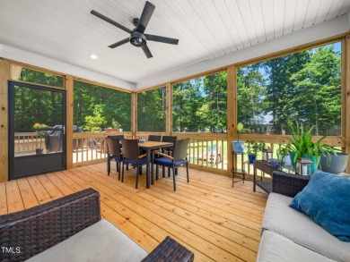 Resort-style living awaits in this beautifully crafted 2023 on River Golf and County Club at Lake Royale in North Carolina - for sale on GolfHomes.com, golf home, golf lot