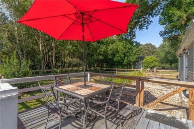 This Salt Box-inspired beauty, echoes the cozy charm of early on Tides Inn Par 3 Course in Virginia - for sale on GolfHomes.com, golf home, golf lot