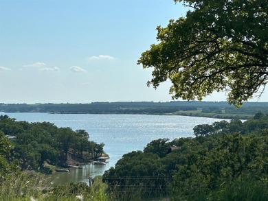 Beautiful build site right across the street from Leisure Lake on Nocona Hills Golf Course in Texas - for sale on GolfHomes.com, golf home, golf lot