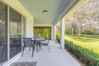 Welcome to your MOVE-IN READY Johnson-built block home, nestled on Turnbull Bay Golf Club in Florida - for sale on GolfHomes.com, golf home, golf lot