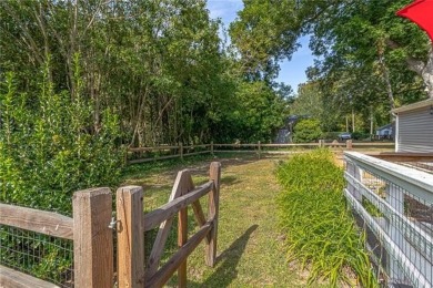 This Salt Box-inspired beauty, echoes the cozy charm of early on Tides Inn Par 3 Course in Virginia - for sale on GolfHomes.com, golf home, golf lot