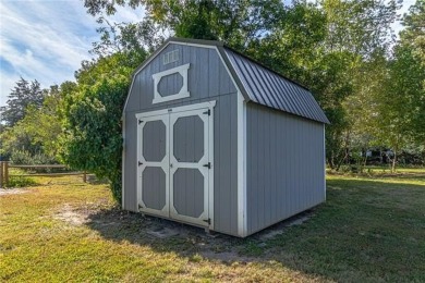 This Salt Box-inspired beauty, echoes the cozy charm of early on Tides Inn Par 3 Course in Virginia - for sale on GolfHomes.com, golf home, golf lot