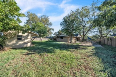 WELCOME HOME! 2 Bedroom + 2 Baths of turn-key modern living with on Pecan Plantation Country Club in Texas - for sale on GolfHomes.com, golf home, golf lot