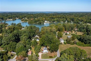 This Salt Box-inspired beauty, echoes the cozy charm of early on Tides Inn Par 3 Course in Virginia - for sale on GolfHomes.com, golf home, golf lot
