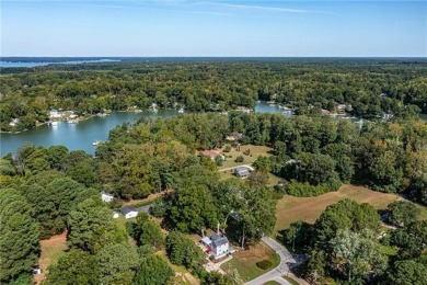 This Salt Box-inspired beauty, echoes the cozy charm of early on Tides Inn Par 3 Course in Virginia - for sale on GolfHomes.com, golf home, golf lot