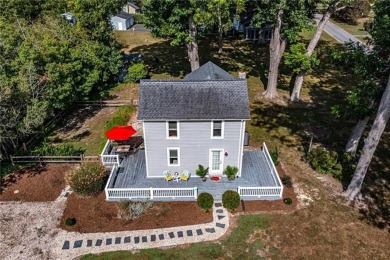 This Salt Box-inspired beauty, echoes the cozy charm of early on Tides Inn Par 3 Course in Virginia - for sale on GolfHomes.com, golf home, golf lot