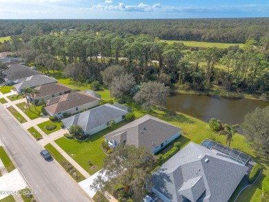 Welcome to your MOVE-IN READY Johnson-built block home, nestled on Turnbull Bay Golf Club in Florida - for sale on GolfHomes.com, golf home, golf lot