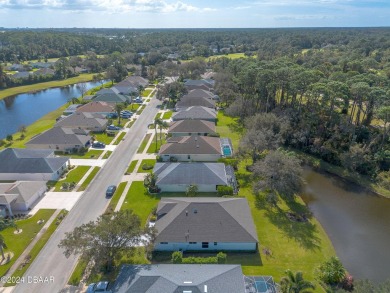 Welcome to your MOVE-IN READY Johnson-built block home, nestled on Turnbull Bay Golf Club in Florida - for sale on GolfHomes.com, golf home, golf lot