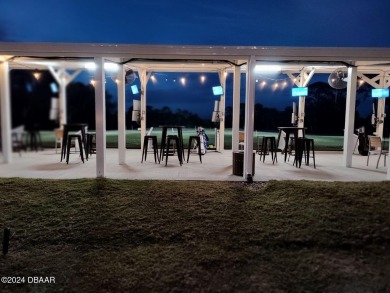 Welcome to your MOVE-IN READY Johnson-built block home, nestled on Turnbull Bay Golf Club in Florida - for sale on GolfHomes.com, golf home, golf lot