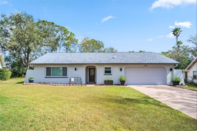 Welcome to your beautifully renovated 3-bedroom, 2-bath dream on Highland Lakes Executive Golf Course in Florida - for sale on GolfHomes.com, golf home, golf lot