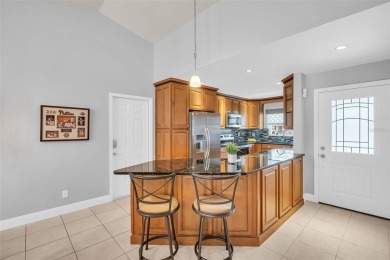 Welcome to your beautifully renovated 3-bedroom, 2-bath dream on Highland Lakes Executive Golf Course in Florida - for sale on GolfHomes.com, golf home, golf lot