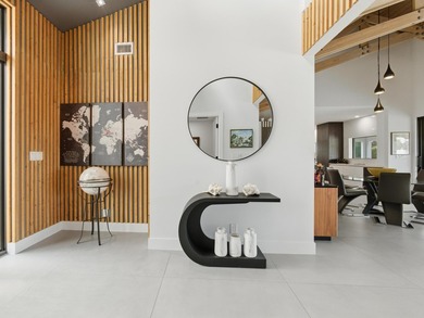 Exceptional modern residence fully renovated with a 1,700 - on Seagate Country Club in Florida - for sale on GolfHomes.com, golf home, golf lot