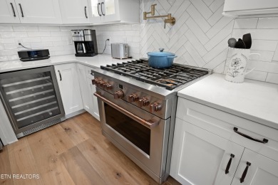 Experience refined living in this stunning modern farmhouse on Tennessee National Golf Club in Tennessee - for sale on GolfHomes.com, golf home, golf lot