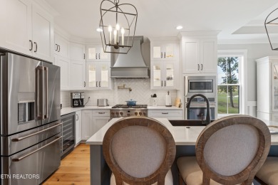 Experience refined living in this stunning modern farmhouse on Tennessee National Golf Club in Tennessee - for sale on GolfHomes.com, golf home, golf lot