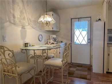 This home is full of love! Cozy and comfortable, fully furnished on Indianwood Golf and Country Club in Florida - for sale on GolfHomes.com, golf home, golf lot