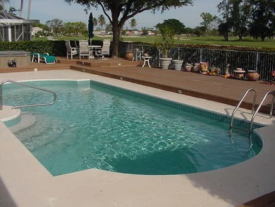 Elegantly and totally remodeled estate home with expansive views on PGA National Golf Club in Florida - for sale on GolfHomes.com, golf home, golf lot