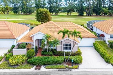 Elegantly and completely remodeled estate home with expansive on PGA National Golf Club in Florida - for sale on GolfHomes.com, golf home, golf lot