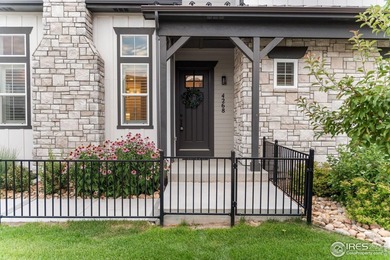 Experience maintenance-free living in Harmony Club w/ golf on Harmony Golf Club in Colorado - for sale on GolfHomes.com, golf home, golf lot