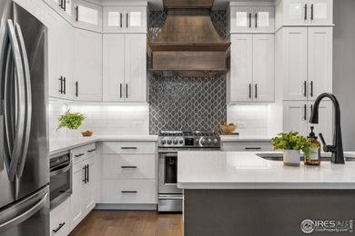 Experience maintenance-free living in Harmony Club w/ golf on Harmony Golf Club in Colorado - for sale on GolfHomes.com, golf home, golf lot