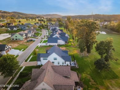 Experience refined living in this stunning modern farmhouse on Tennessee National Golf Club in Tennessee - for sale on GolfHomes.com, golf home, golf lot