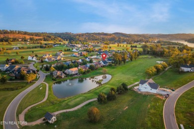 Experience refined living in this stunning modern farmhouse on Tennessee National Golf Club in Tennessee - for sale on GolfHomes.com, golf home, golf lot