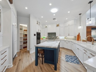 Step into a world where luxury meets tranquility in this on Bonita Bay West in Florida - for sale on GolfHomes.com, golf home, golf lot