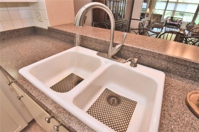 Welcome to 1442 Carlow Circle. This easy maintenance attached on Halifax Plantation Golf Club in Florida - for sale on GolfHomes.com, golf home, golf lot