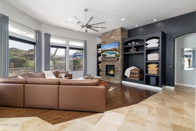 This exceptional home showcases a stunning open-concept design on Superstition Mountain Club - Lost Gold in Arizona - for sale on GolfHomes.com, golf home, golf lot