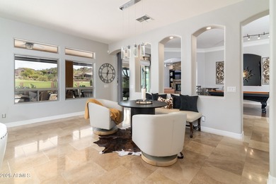 This exceptional home showcases a stunning open-concept design on Superstition Mountain Club - Lost Gold in Arizona - for sale on GolfHomes.com, golf home, golf lot