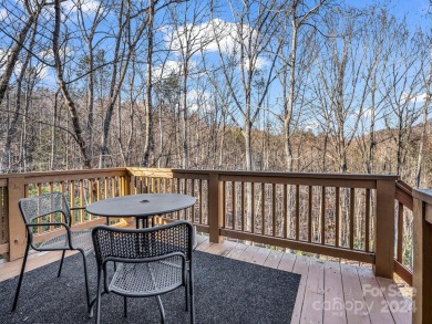 Offered turnkey and fully furnished, this energy efficient newer on Rumbling Bald Resort on Lake Lure in North Carolina - for sale on GolfHomes.com, golf home, golf lot