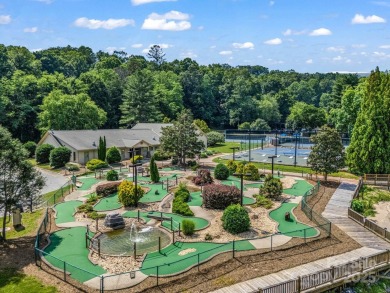 Offered turnkey and fully furnished, this energy efficient newer on Rumbling Bald Resort on Lake Lure in North Carolina - for sale on GolfHomes.com, golf home, golf lot