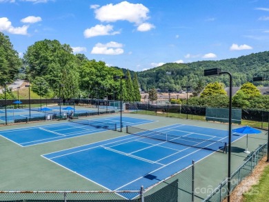 Offered turnkey and fully furnished, this energy efficient newer on Rumbling Bald Resort on Lake Lure in North Carolina - for sale on GolfHomes.com, golf home, golf lot